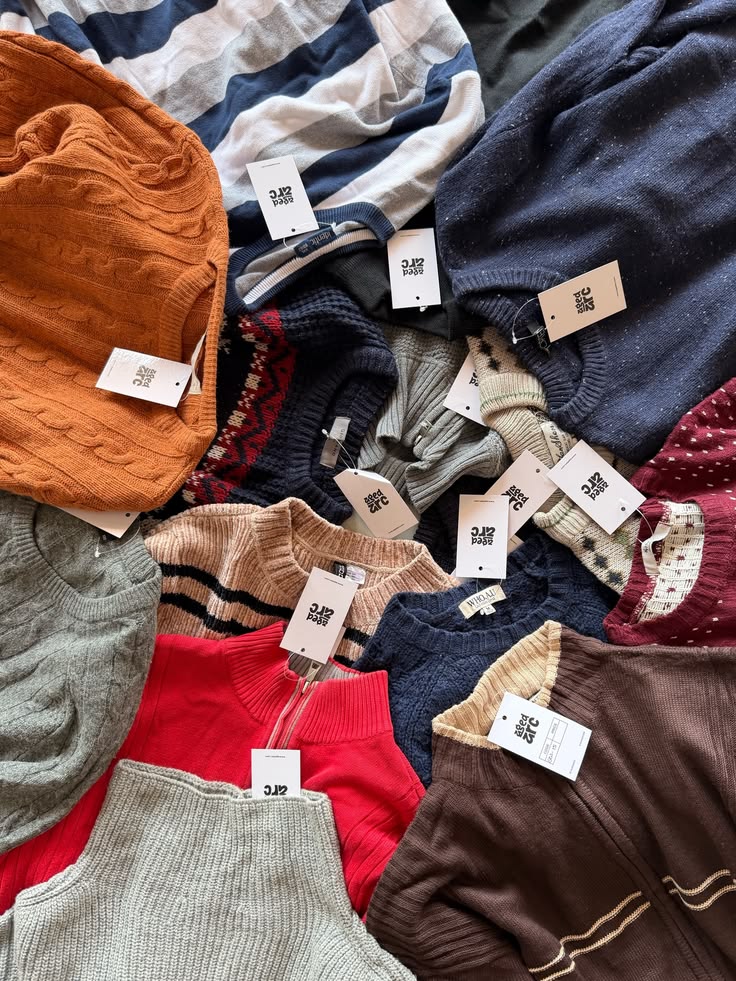 SWEATERS